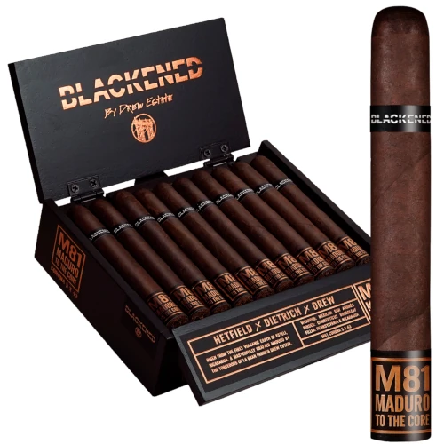 An open box of Blackened M81 Maduro to the Core cigars by Drew Estate, displaying neatly arranged cigars with bold black and copper branding.